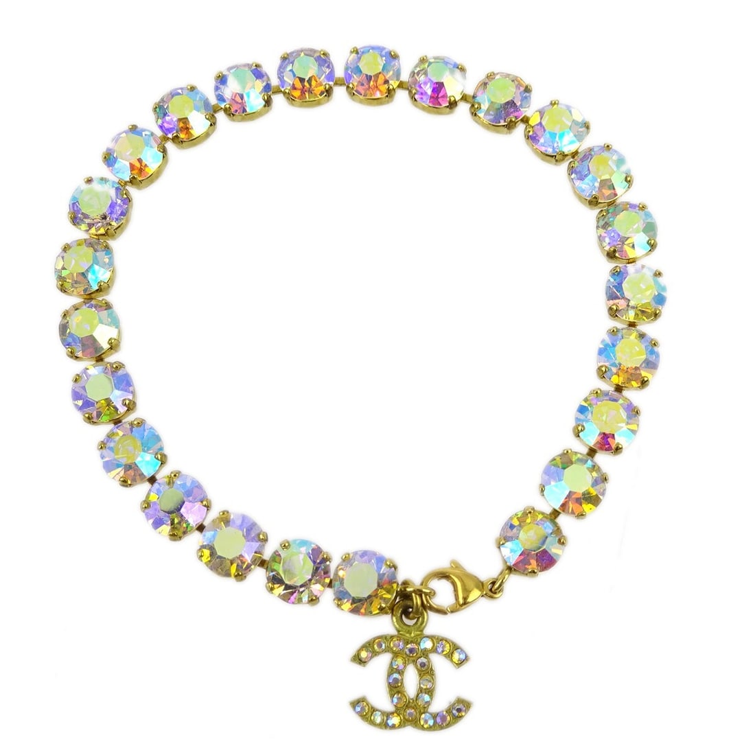 CHANEL 95P Gold Plated Chain Anklet with Rhinestones: CHANEL 95P Gold Plated Chain Anklet with Rhinestones Chanel gold-plated chain anklet with rhinestone detailing and a Chanel charm. Marked 95P, this piece is made in France and comes with a box. Condit