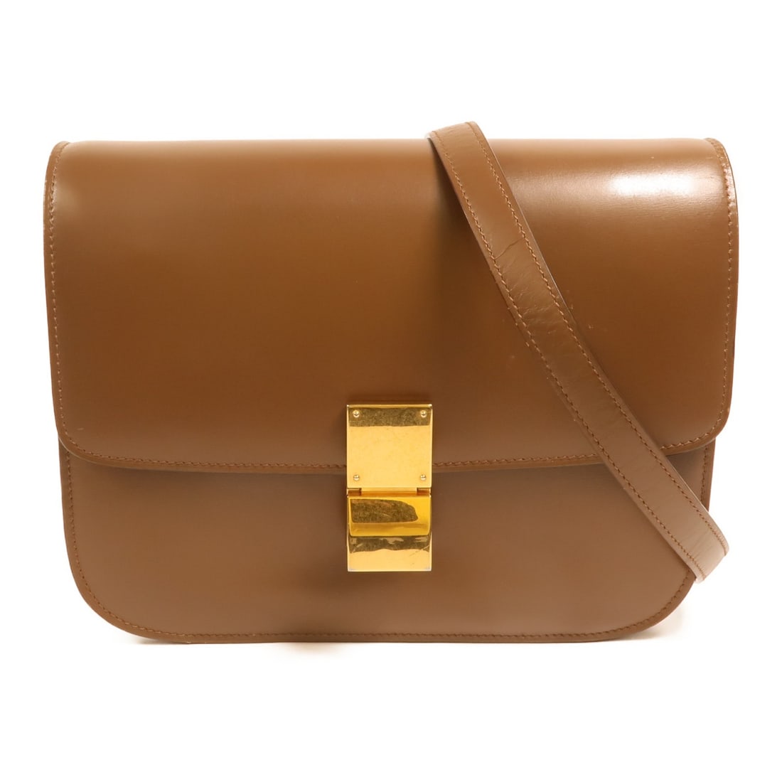CELINE Classic Box Medium Brown Calfskin Shoulder Bag: CELINE Classic Box Medium Brown Calfskin Shoulder Bag CELINE Classic Box Medium Shoulder Bag in brown calfskin leather, designed in a shoulder bag style for women. It features a flap closure, an inter
