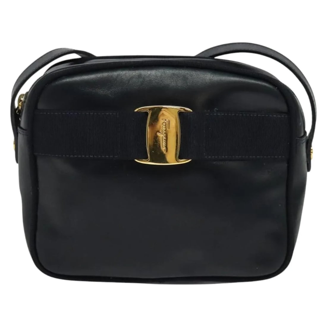 Salvatore Ferragamo Vala Navy Leather Shoulder Bag: Salvatore Ferragamo Vala Navy Leather Shoulder Bag This Salvatore Ferragamo Vala Shoulder Bag is crafted from navy leather and designed for women. The bag features a structured silhouette with metal f