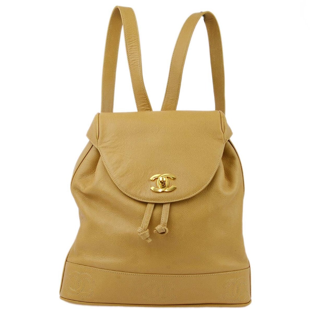 CHANEL Caviar Beige Backpack in Calfskin with Triple CC Turnlock: CHANEL Caviar Beige Backpack in Calfskin with Triple CC Turnlock Medium Chanel backpack in beige caviar skin leather with a drawstring and turnlock closure. The design features Triple CC chain styling