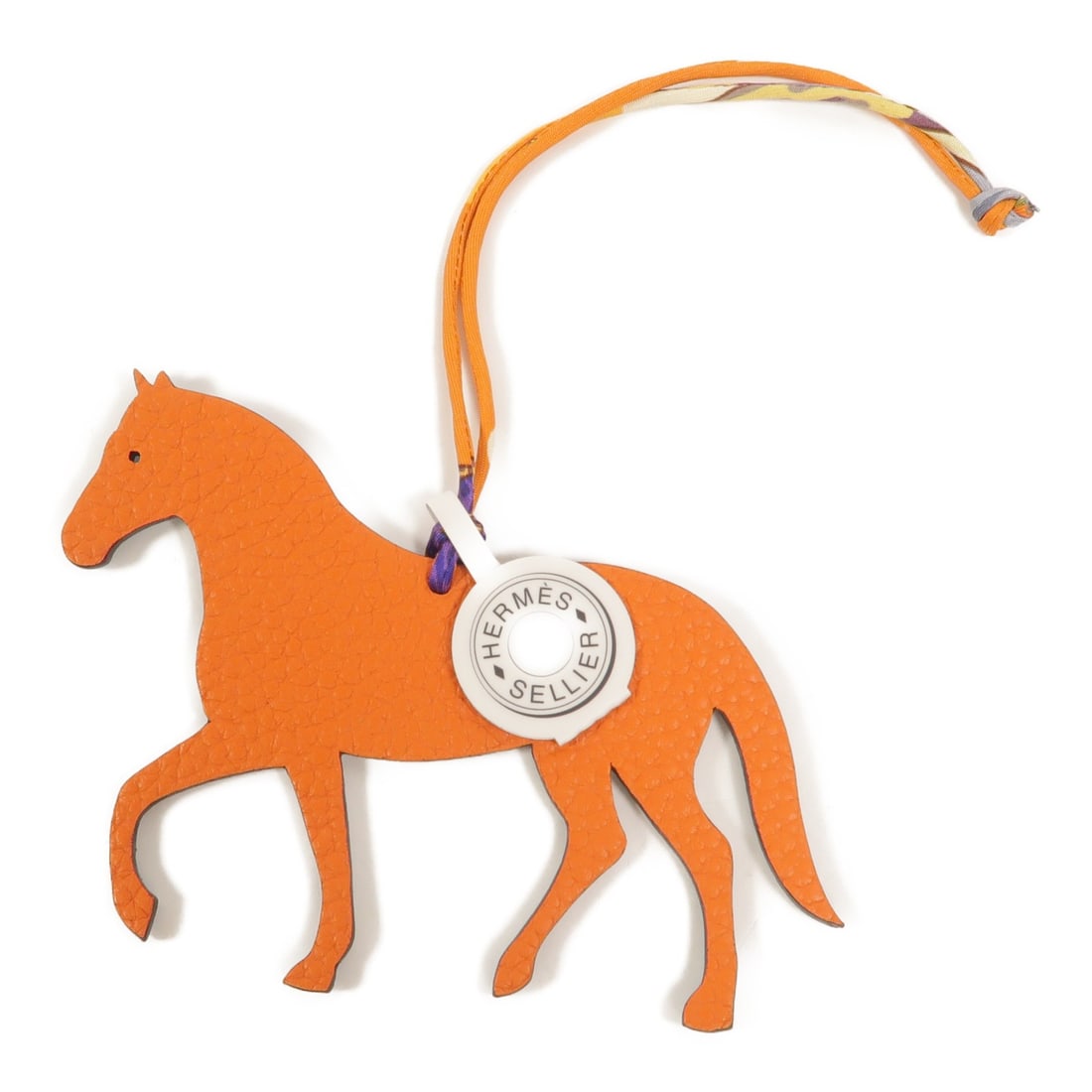 Hermes Petit H horse bag charm in orange teal leather silk: Hermes Petit H horse bag charm in orange teal leather silk Hermes Petit H Horse Charm made from calfskin and goatskin leather with silk accents in orange and teal. It comes with a storage box and is d