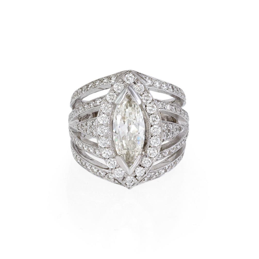 Stunning 18k White Gold 2.67ct Marquise Round Diamond Cocktail Ring: Stunning 18k White Gold 2.67ct Marquise Round Diamond Cocktail Ring This stunning cocktail ring is expertly crafted from 18k white gold and features a striking large marquise cut diamond at its center