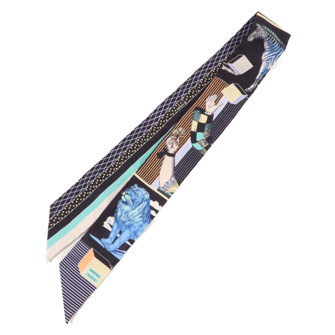 Hermes Twilly Silk Scarf Multicolor Blue Black with Box: Hermes Twilly Silk Scarf Multicolor Blue Black with Box Hermes Twilly scarf in multicolor with blue and black accents, made of silk. It measures 85 cm x 5 cm (33.5 in x 2.0 in) and comes with a storag