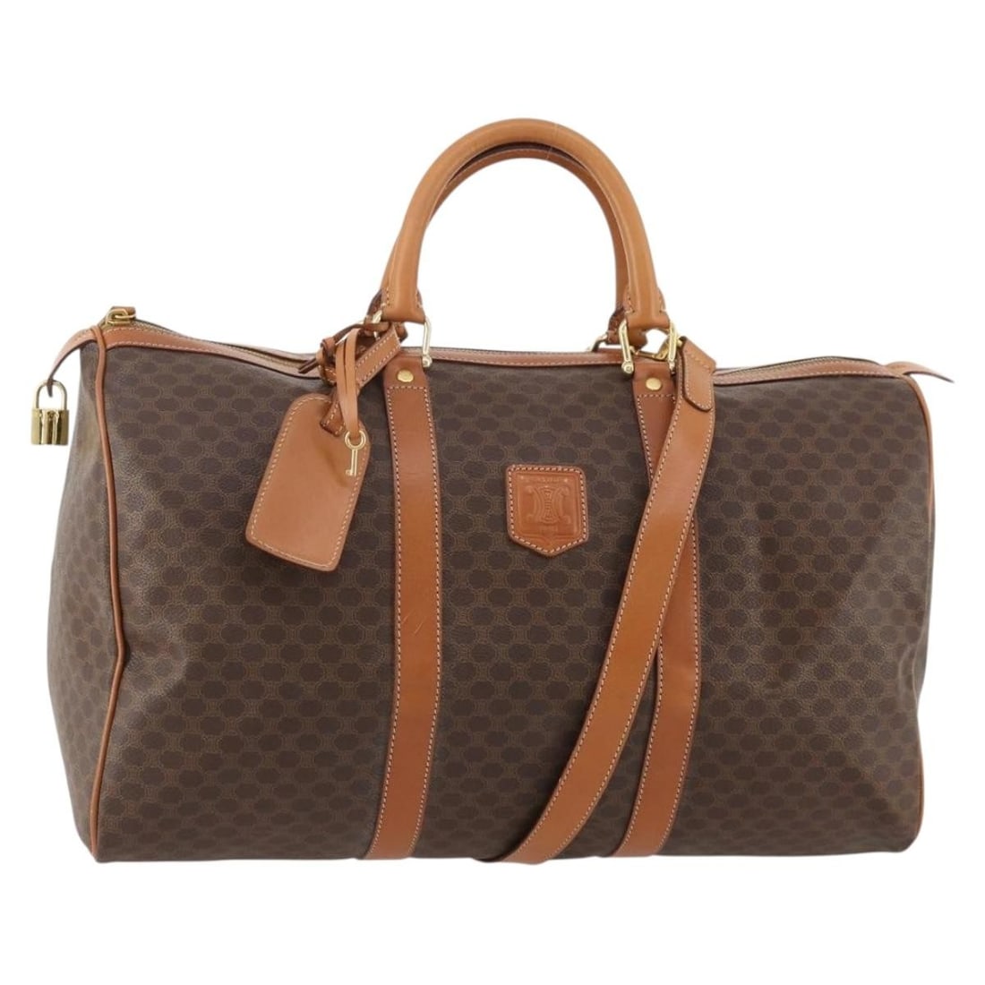 Celine Macadam 2way Boston Bag Brown PVC Leather with Strap: Celine Macadam 2way Boston Bag Brown PVC Leather with Strap A CELINE 2-way Boston bag crafted from PVC leather and Macadam canvas in brown with gold-tone hardware. It is made in Italy and comes with a