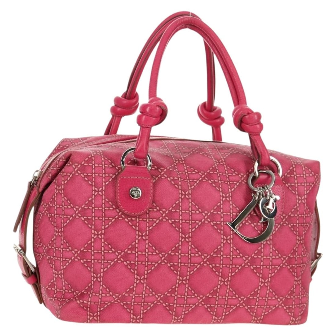 Pink and Silver Coated Canvas Dior Cannage Handbag with Charm: Pink and Silver Coated Canvas Dior Cannage Handbag with Charm This Christian Dior Canage handbag features a pink and silver coated canvas exterior with a matching charm accessory. The bag is crafted i