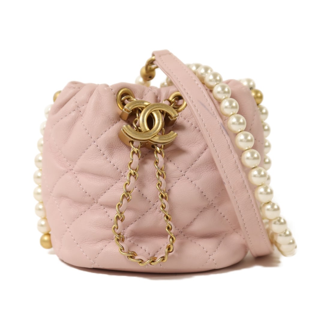CHANEL CC Pearl Bucket Shoulder Bag Pink Lambskin GHW: CHANEL CC Pearl Bucket Shoulder Bag Pink Lambskin GHW A CHANEL CC GHW bucket pearl shoulder bag in pink lambskin leather. The bag features a pearl shoulder detail and a bucket-style silhouette. Condit