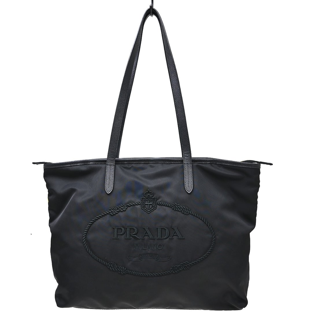 Prada Large Black Nylon Tote Bag with Dust Bag: Prada Large Black Nylon Tote Bag with Dust Bag Prada tote handbag in black nylon with leather trim and canvas lining. This large women's bag features logo accents, an interior zipper pocket and one ad