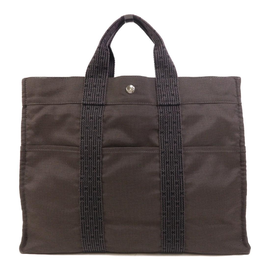 Hermes Herline MM Canvas Tote Handbag Gray PHW: Hermes Herline MM Canvas Tote Handbag Gray PHW A Hermes Herline MM hand bag/tote bag in gray canvas. The bag features a top handle with a 28 cm drop, an open exterior pocket layout, and one open inter