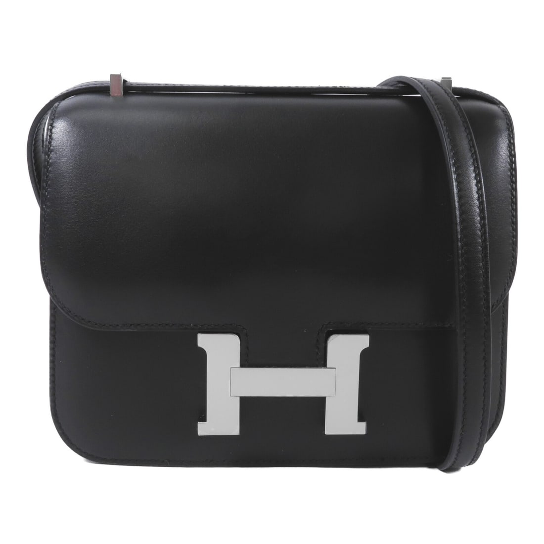 Hermes Constance Mini Evercalf Shoulder Bag Noir PHW: Hermes Constance Mini Evercalf Shoulder Bag Noir PHW A HERMES Constance Mini shoulder bag in Evercalf leather, presented in Noir black. The bag features a flap closure, two open interior pockets, and 