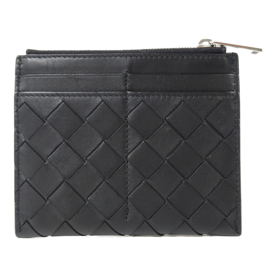 Bottega Veneta BV calfskin card and coin case black: Bottega Veneta BV calfskin card and coin case black Bottega Veneta BV card and coin card case in black calfskin leather. It features a fastener closure, one open pocket, and six card slots. The item c