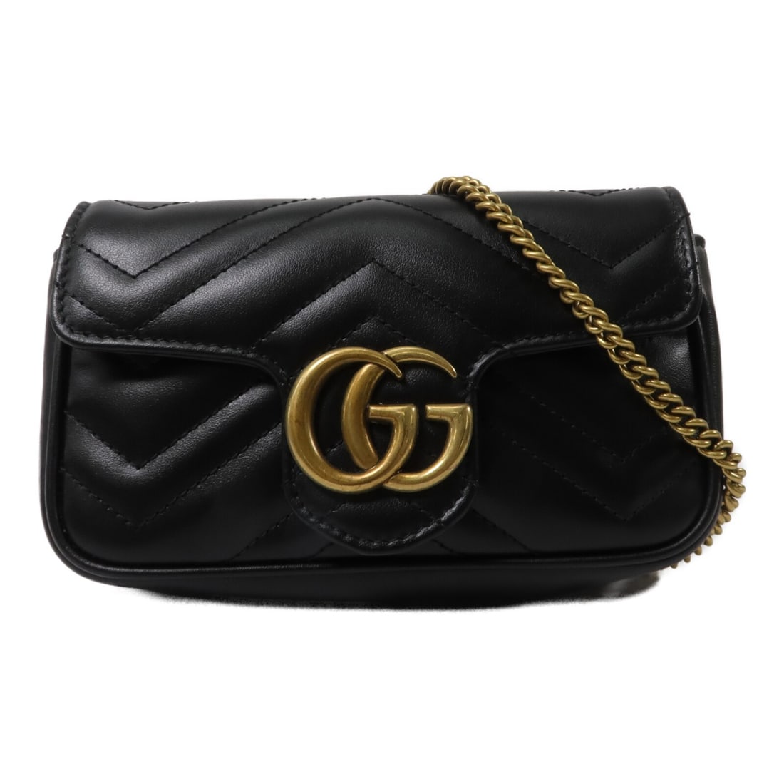 GUCCI GG Marmont Super Mini Shoulder Bag 476433 Black Calfskin: GUCCI GG Marmont Super Mini Shoulder Bag 476433 Black Calfskin A Gucci GG Marmont Super Mini Chain Shoulder Bag in black calfskin leather with a chain shoulder strap. It is a women's regular-size shou