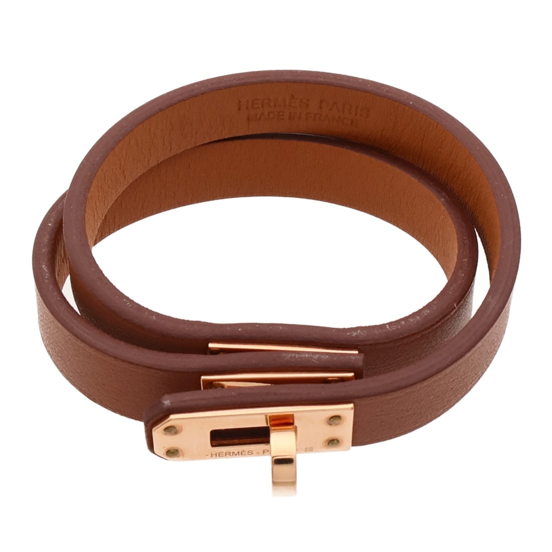 Hermes Kelly Double Tour Bracelet Brown Swift Leather Gold Tone: Hermes Kelly Double Tour Bracelet Brown Swift Leather Gold Tone Hermes Kelly Double Tour bracelet in Swift leather and calfskin (cowhide), presented in a gold x brown color combination. It is a women'
