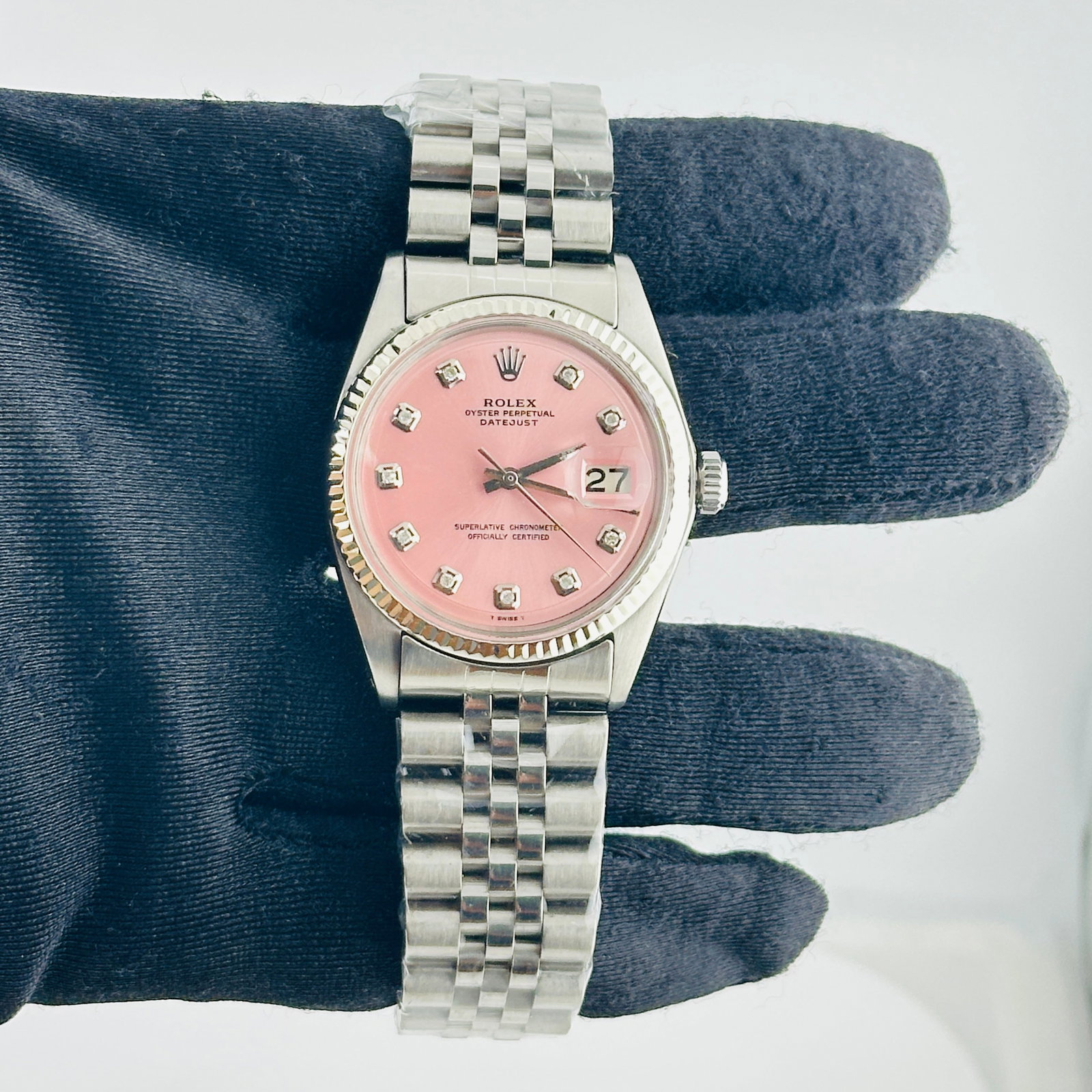 Rolex Datejust Ref. 1601 Mens Watch with aftermarket Pink Diamond Dial: Rolex Datejust Ref. 1601 Mens Watch with aftermarket Pink Diamond Dial Mens Rolex Datejust with reference number 1601. Features an Aftermarket pink diamond dial, fluted bezel, and Aftermarket Jubilee
