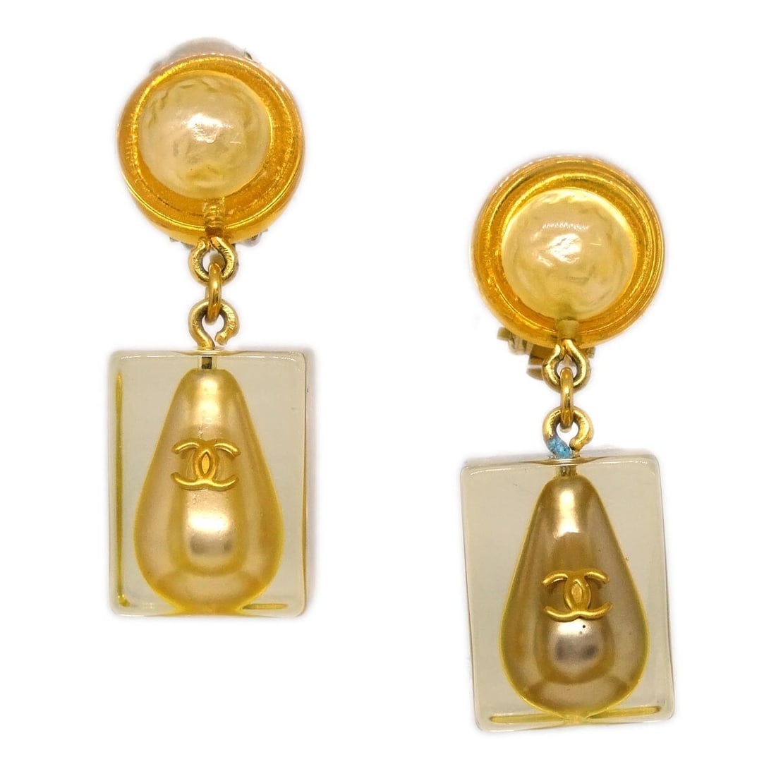 CHANEL 97P Gold Plated Acrylic Clip On Dangle Earrings: CHANEL 97P Gold Plated Acrylic Clip On Dangle Earrings Clip-on Chanel dangle earrings in gold-plated metal with acrylic accents. Marked 97P and made in France, this pair has a dangle/drop silhouette a