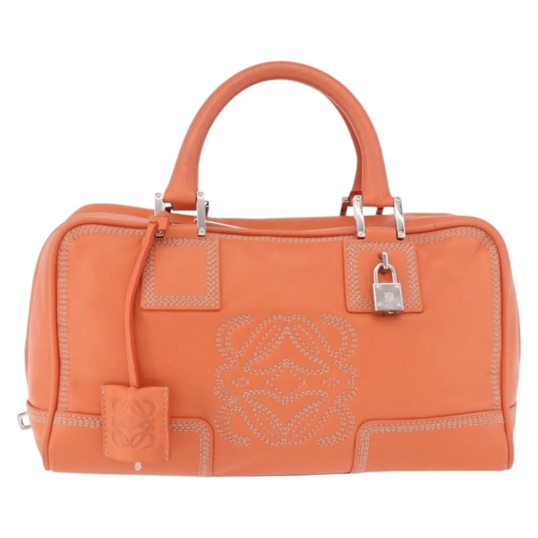 Loewe Anagram orange leather handbag: Loewe Anagram orange leather handbag Loewe Anagram leather bag in orange. This piece is made in Spain and is presented in good condition with visible wear, including some loss of shape to the