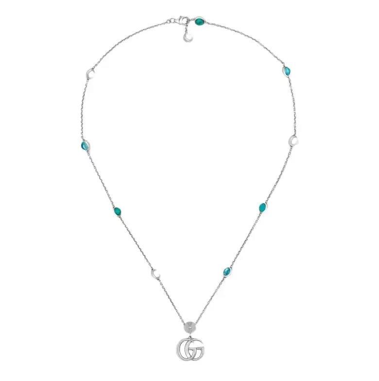 Gucci Double G Necklace 925 Sterling Silver Mother Of Pearl Topaz 17 Inches: Gucci Double G Necklace 925 Sterling Silver Mother Of Pearl Topaz 17 Inches Elevate your accessory collection with this exquisite Gucci Double G Necklace. Crafted from premium 925 sterling silver,