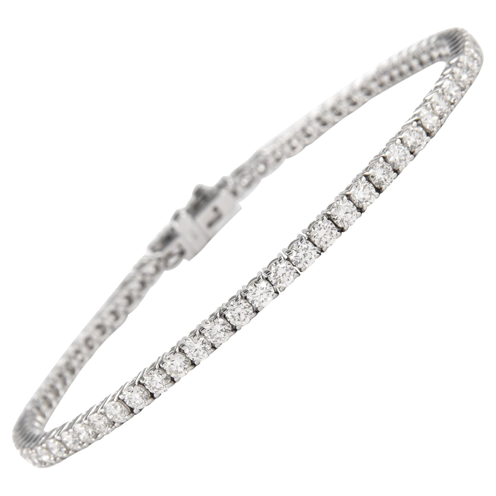 Diamond Tennis Bracelet 3.91ct D-F Round Cut in 18k White Gold 7 Inch: Diamond Tennis Bracelet 3.91ct D-F Round Cut in 18k White Gold 7 Inch This exquisite tennis bracelet features 65 round brilliant diamonds totaling 3.91 carats, with D-F color and SI1/SI2 clarity. The 