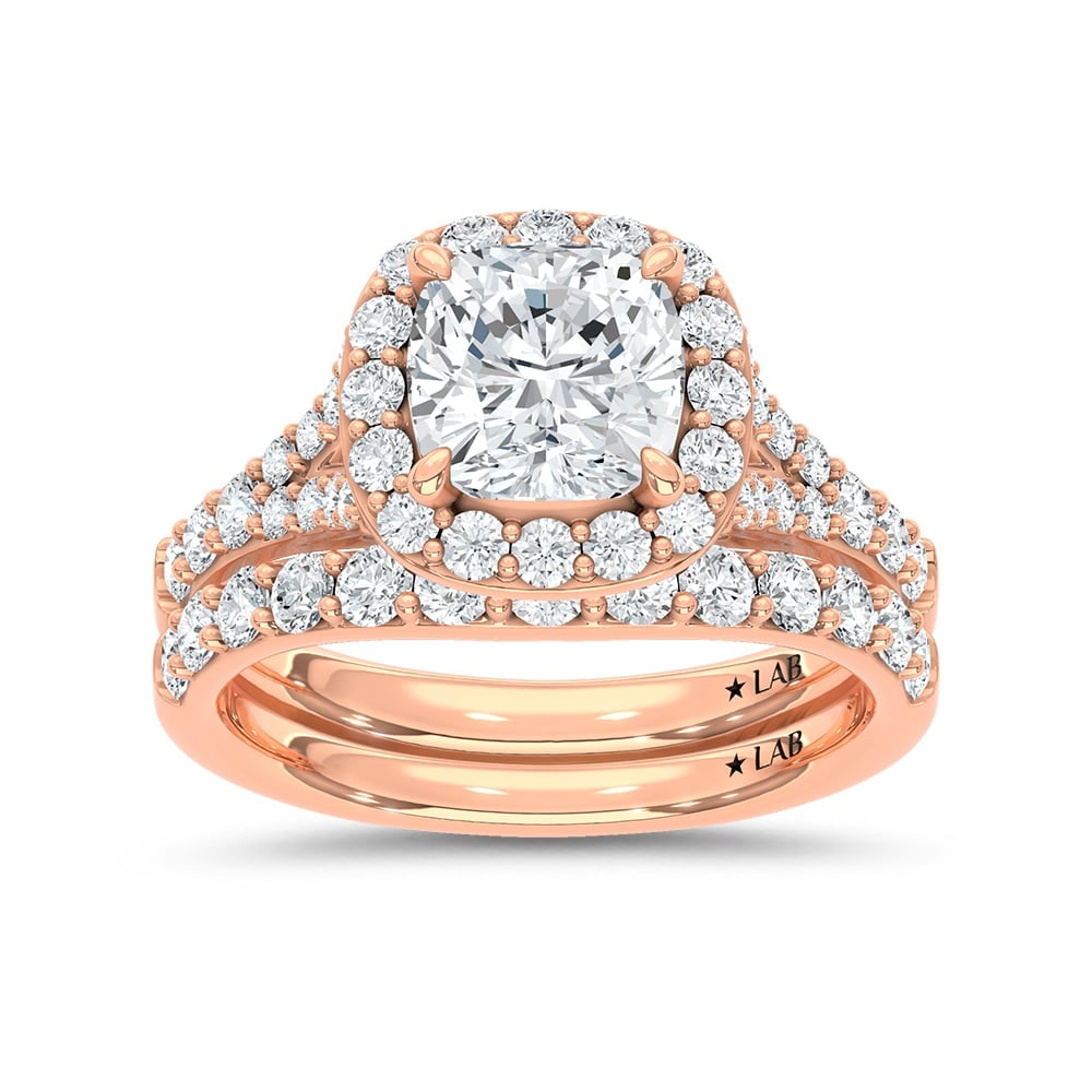 14K Rose Gold 3 Ct.Tw. Lab Grown Diamond Cushion Shape Bridal Ring (IGI Certified Center 2ct): 14K Rose Gold 3 Ct.Tw. Lab Grown Diamond Cushion Shape Bridal Ring (IGI Certified Center 2ct) 14k Rose Gold Stone Color: D-f Stone Clarity: Vs Each ring is presented in standard size 6.5. Complimentar