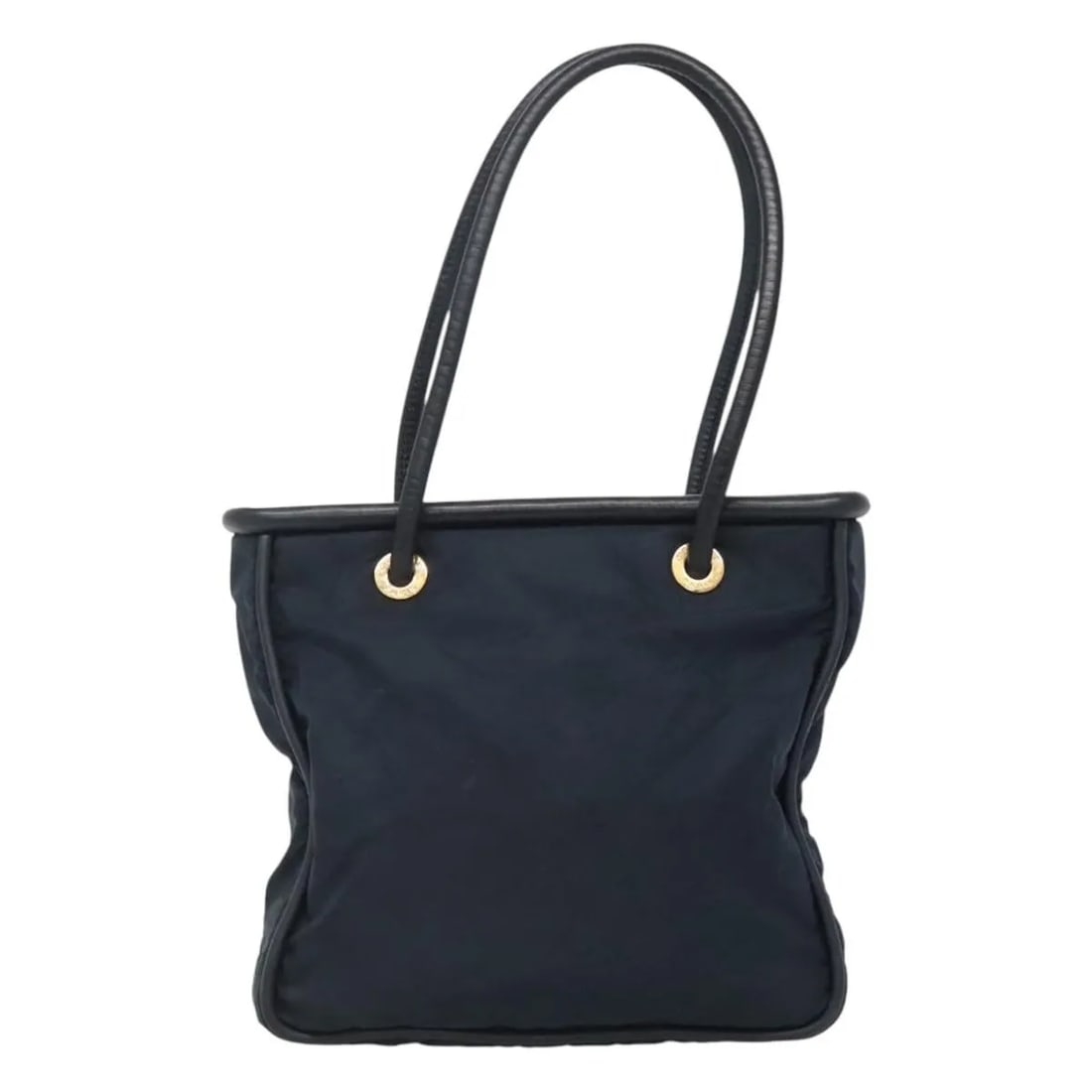 Celine Circle Logo Navy Nylon Handbag Made in Italy: Celine Circle Logo Navy Nylon Handbag Made in Italy This Celine Circle Logo Handbag is crafted from navy nylon and features a classic design tailored for women. Made in Italy, it displays the iconic c