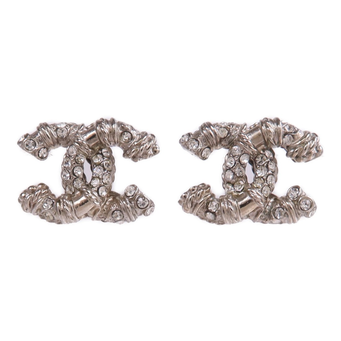 CHANEL CC Silver Tone Pierced Earrings: CHANEL CC Silver Tone Pierced Earrings CHANEL pierced CC earrings in silver metal. The earrings are for women and measure 10mm x 13mm. Condition is AB: Very Good. Accessories are not included. Specifi