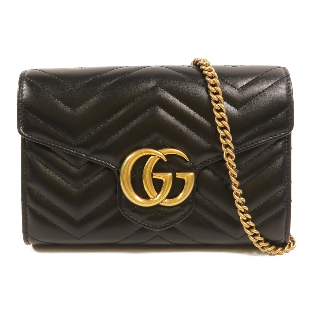 Gucci GG Marmont 474575 black calfskin chain shoulder bag: Gucci GG Marmont 474575 black calfskin chain shoulder bag A Gucci GG Marmont chain shoulder bag in black calfskin (cowhide) leather. It features a chain shoulder strap, hook button closure, and a well