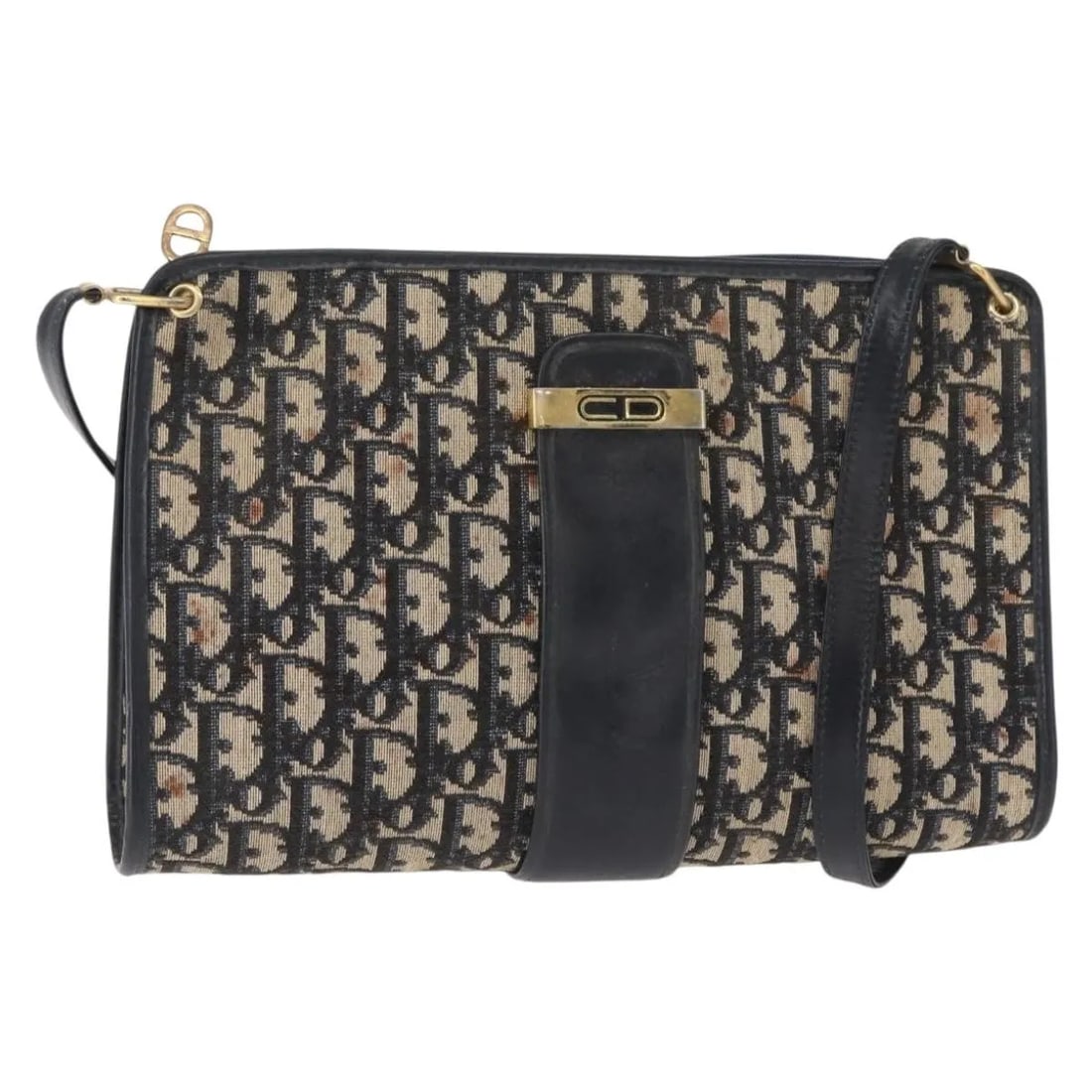 Christian Dior Vintage CD Trotter Navy Canvas Shoulder Bag: Christian Dior Vintage CD Trotter Navy Canvas Shoulder Bag This vintage Christian Dior CD Trotter shoulder bag is crafted from navy canvas with leather accents. It features a shoulder strap and metal 