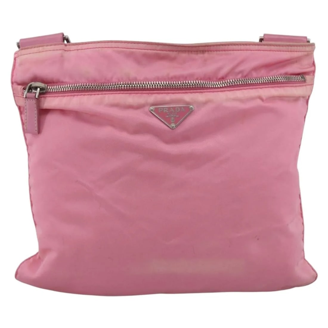 Prada Tessuto Pink Nylon Front Pocket Messenger Bag: Prada Tessuto Pink Nylon Front Pocket Messenger Bag This Prada Front Pocket Messenger Bag is crafted from pink nylon and designed for women. The bag features a front pocket and is made in Italy. It sh