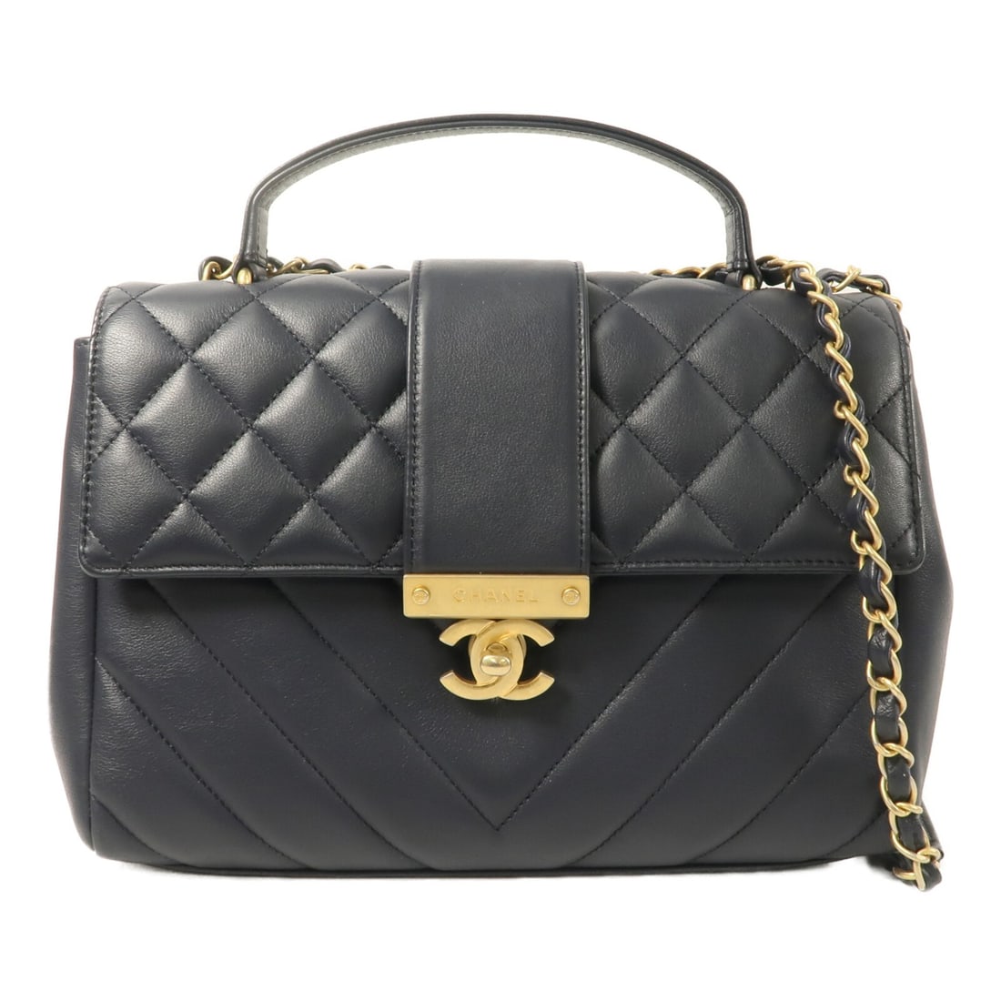 CHANEL top handle chain shoulder bag navy lambskin CC GHW: CHANEL top handle chain shoulder bag navy lambskin CC GHW A CHANEL CC chain shoulder bag with handle, crafted in lambskin (sheep leather) and finished in navy blue. It features a turn lock closure, an
