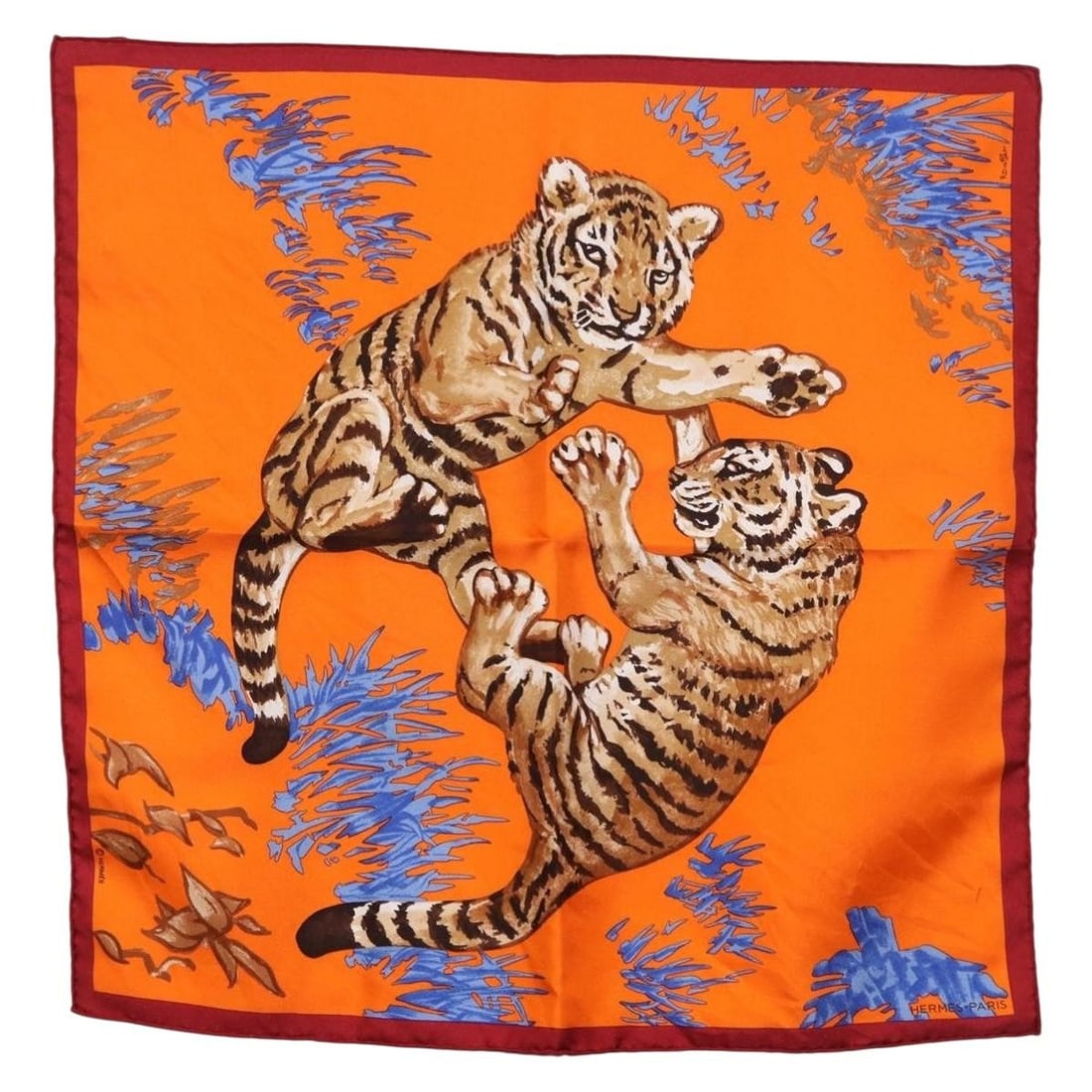 HERMES Les Tigreaux 45cm Silk Scarf Orange France: HERMES Les Tigreaux 45cm Silk Scarf Orange France This Hermes Carre 45 scarf features the Les Tigreaux design in orange silk. It is a women's scarf made in France and comes with the item box. The piec