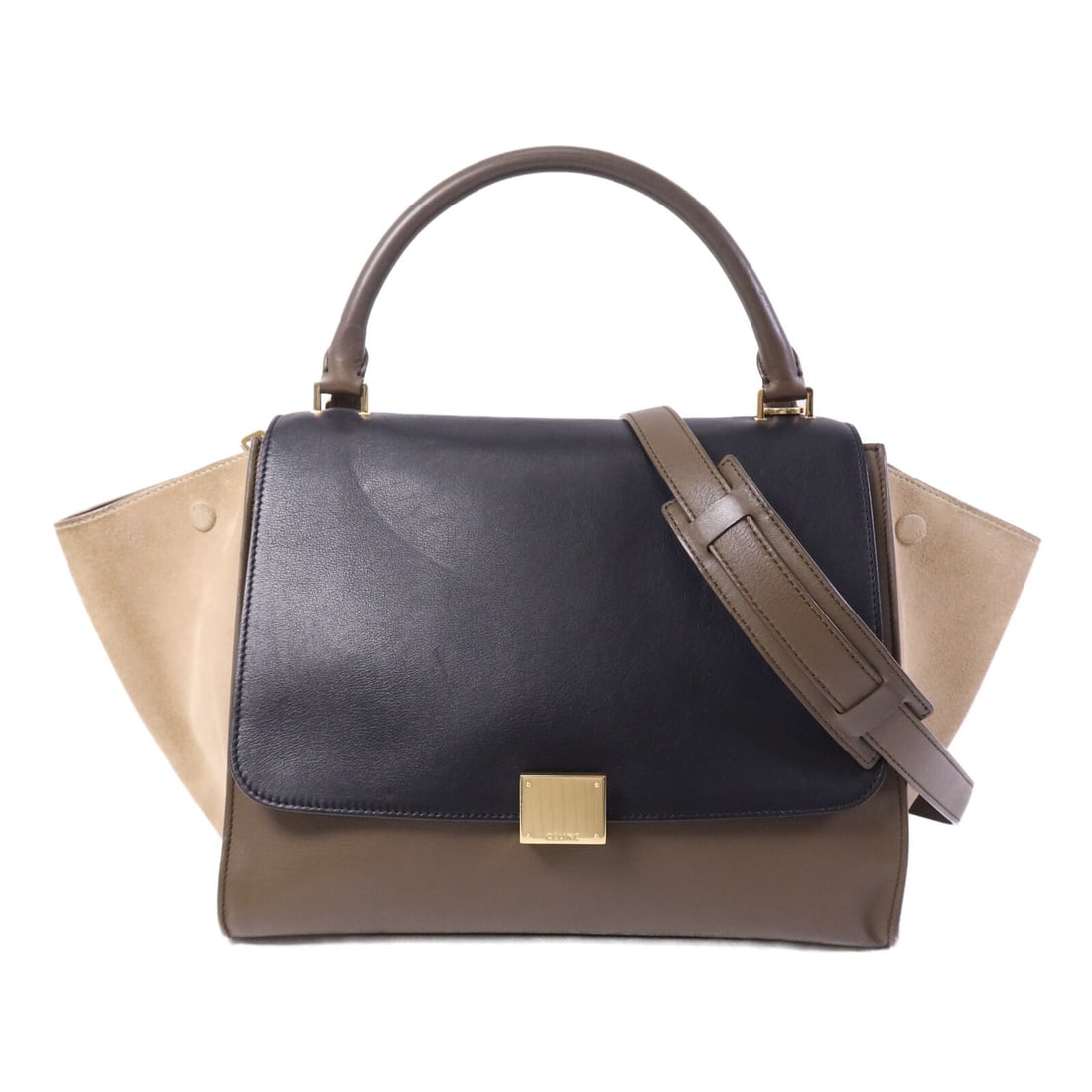 CELINE Trapeze 2 Way Shoulder Bag Black Beige Calfskin Suede: CELINE Trapeze 2 Way Shoulder Bag Black Beige Calfskin Suede This CELINE Trapeze 2-way shoulder bag is crafted from calfskin (cowhide) and suede in black and beige. It features a black frame color, a 