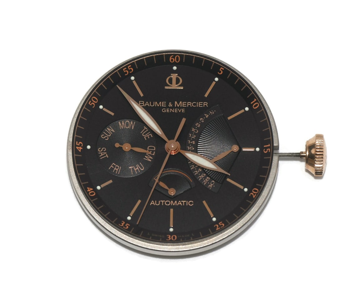 Baume & Mercier Swiss 30 Jewel Watch Movement 34.6MM: Baume & Mercier Swiss 30 Jewel Watch Movement 34.6MM This is a Baume & Mercier 30 jewel movement, crafted in Switzerland. The movement measures 34.6mm and is a genuine component from Baume & Mercier. 