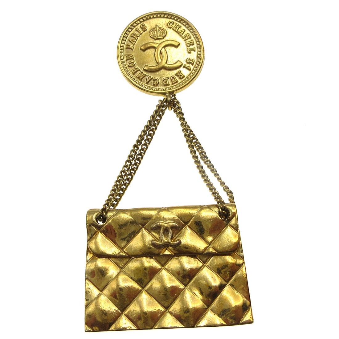 Chanel CC Quilted Bag Motif Gold Plated Brooch Pin: Chanel CC Quilted Bag Motif Gold Plated Brooch Pin Gold-plated CHANEL brooch pin in a CC quilted bag motif. This piece is made in France and comes with a box. Condition shows reasonable wear, includin