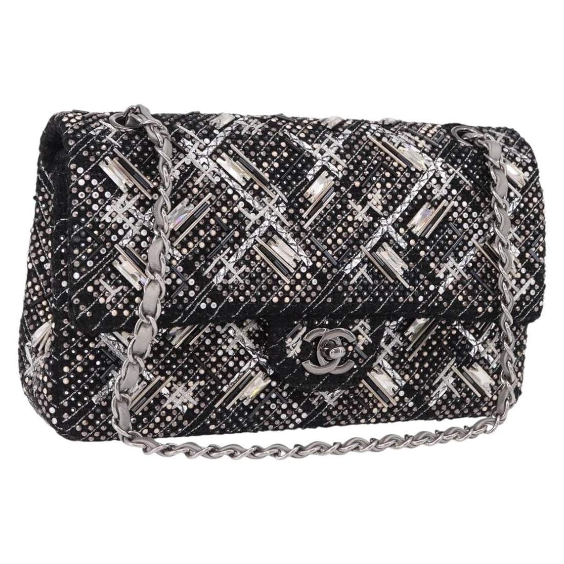 CHANEL Matelasse 25 Tweed Shoulder Bag Black Silver Chain CC: CHANEL Matelasse 25 Tweed Shoulder Bag Black Silver Chain CC This CHANEL shoulder bag is crafted in black and silver canvas and features the Matelasse 25 design. It comes with a dust bag and was made 