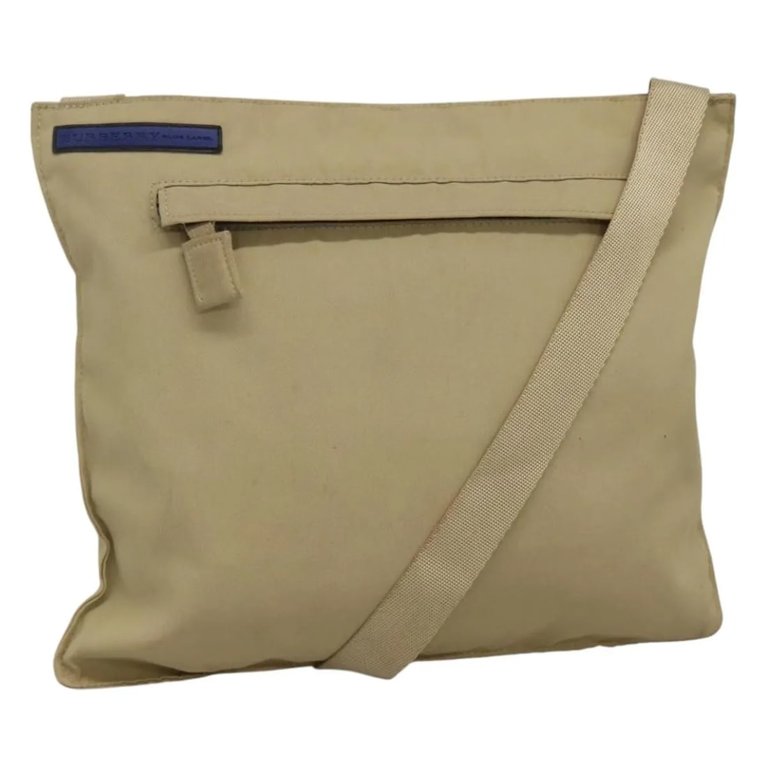 Burberry Blue Label Beige Nylon Shoulder Bag: Burberry Blue Label Beige Nylon Shoulder Bag This Burberry Blue Label shoulder bag features a beige nylon exterior and is designed for unisex use. The bag shows signs of use, including surface rubbing