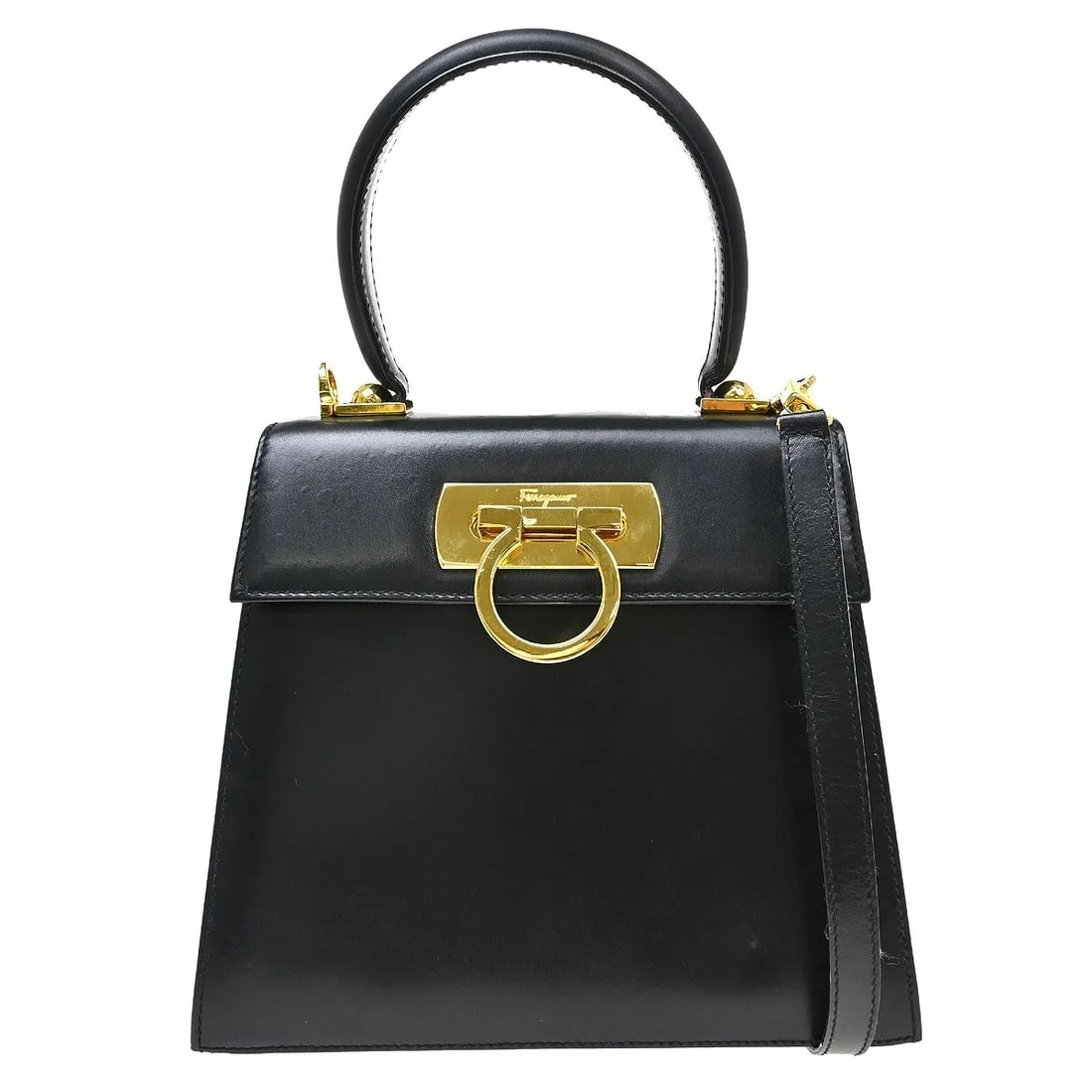 Salvatore Ferragamo Gancini Leather Top Handle Bag Black: Salvatore Ferragamo Gancini Leather Top Handle Bag Black Salvatore Ferragamo Gancini Convertible Top Handle bag in black leather, made in Italy. The bag features a bumpy leather texture and shows fair
