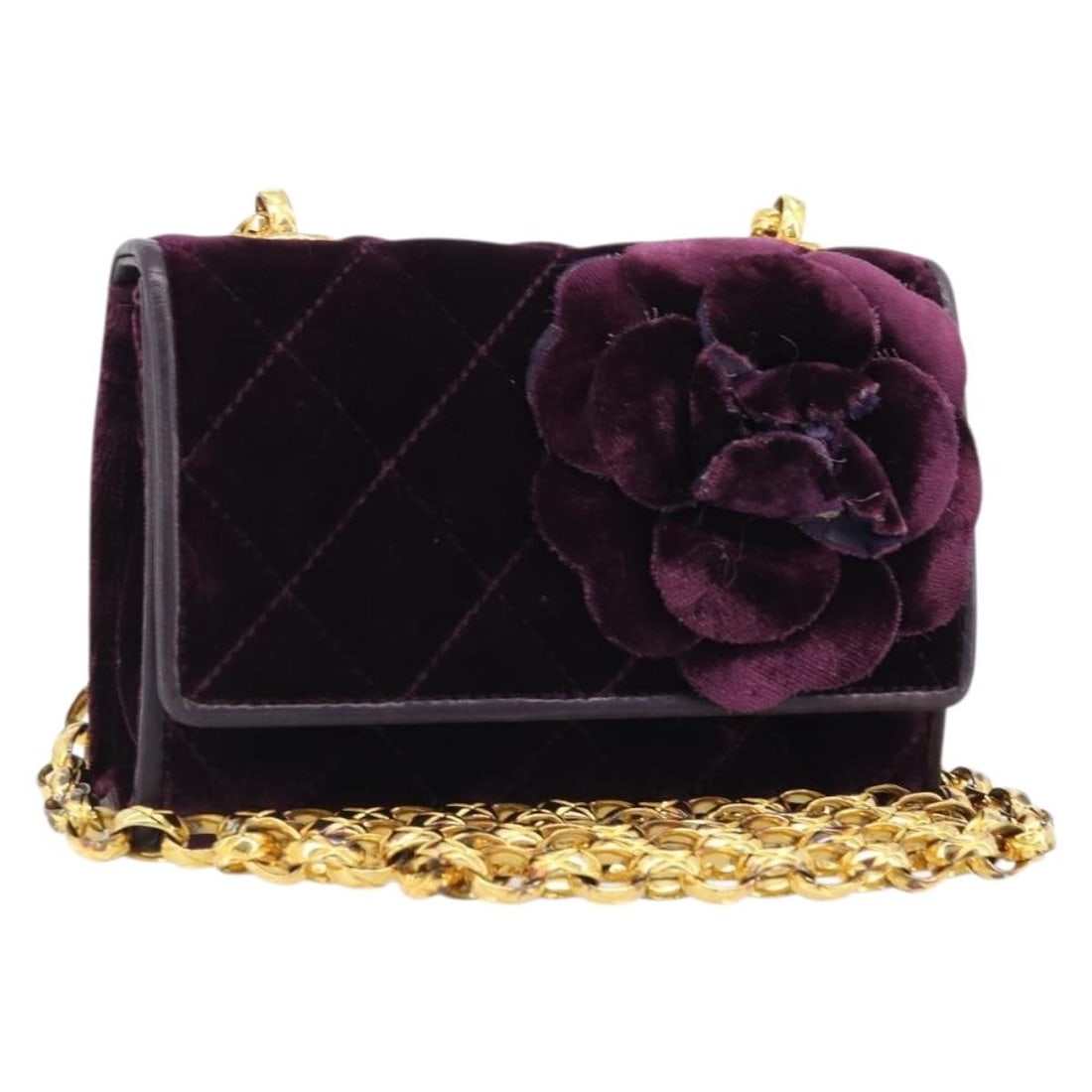 CHANEL Camelia Matelasse Velor Shoulder Bag Purple Gold Tone: CHANEL Camelia Matelasse Velor Shoulder Bag Purple Gold Tone A CHANEL Matelasse Chain Camelia shoulder bag in purple and gold velor, made in Italy. It comes with a dust bag and measures approximately 