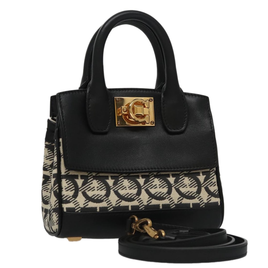 Salvatore Ferragamo Gancini 2way Hand Bag Canvas White Black: Salvatore Ferragamo Gancini 2way Hand Bag Canvas White Black Salvatore Ferragamo Gancini hand bag in white and black canvas, made in Italy. This 2-way style comes with a shoulder strap and dust bag. T