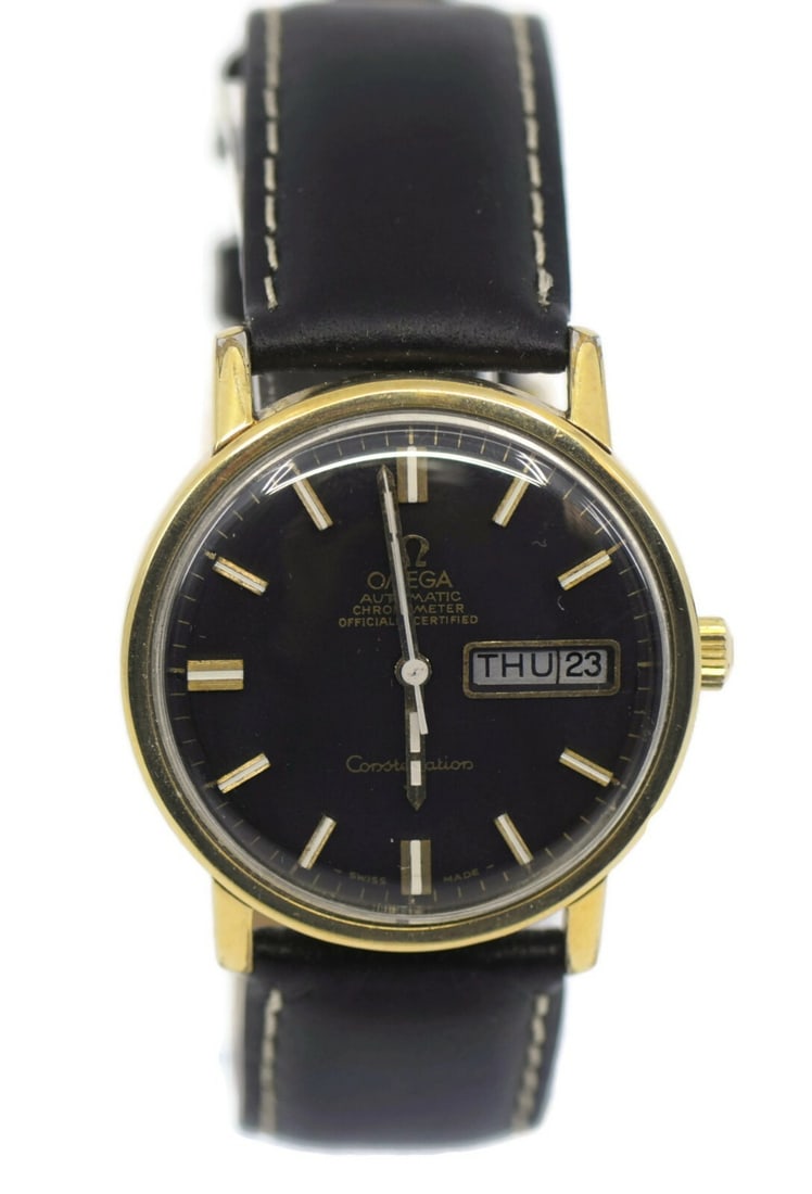 Omega Constellation Day Date Two Tone Watch 168.016 Black Dial: Omega Constellation Day Date Two Tone Watch 168.016 Black Dial Discover the elegance of the Omega Constellation Day Date Two Tone Wristwatch, model 168.016. This sophisticated timepiece features a str