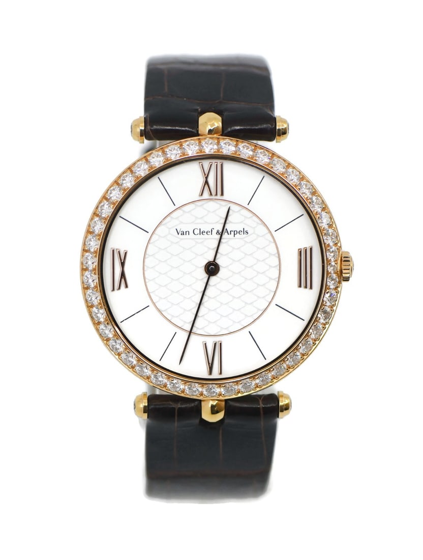 Van Cleef Arpels Pierre Arpels 18K Rose Gold Diamond Wristwatch: Van Cleef Arpels Pierre Arpels 18K Rose Gold Diamond Wristwatch This Van Cleef & Arpels Pierre Arpels wristwatch features a 38mm case crafted from 18K rose gold and is adorned with a diamond bezel and