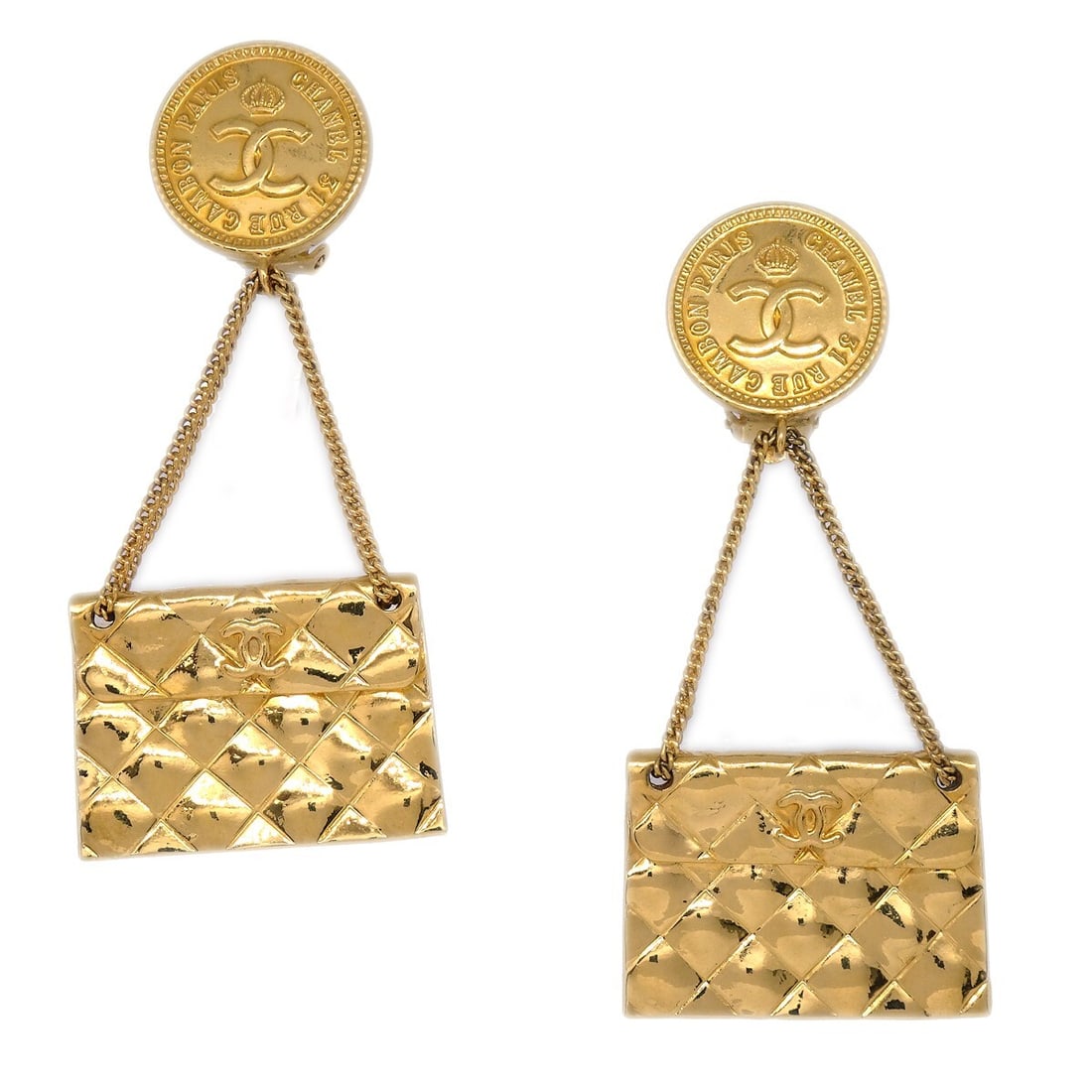 Chanel Gold Plated Clip On Dangle Earrings Bag Motif: Chanel Gold Plated Clip On Dangle Earrings Bag Motif Clip-on Chanel dangle earrings in a bag motif design with a gold plated finish. Made in France, this pair features a button-style top and measures 