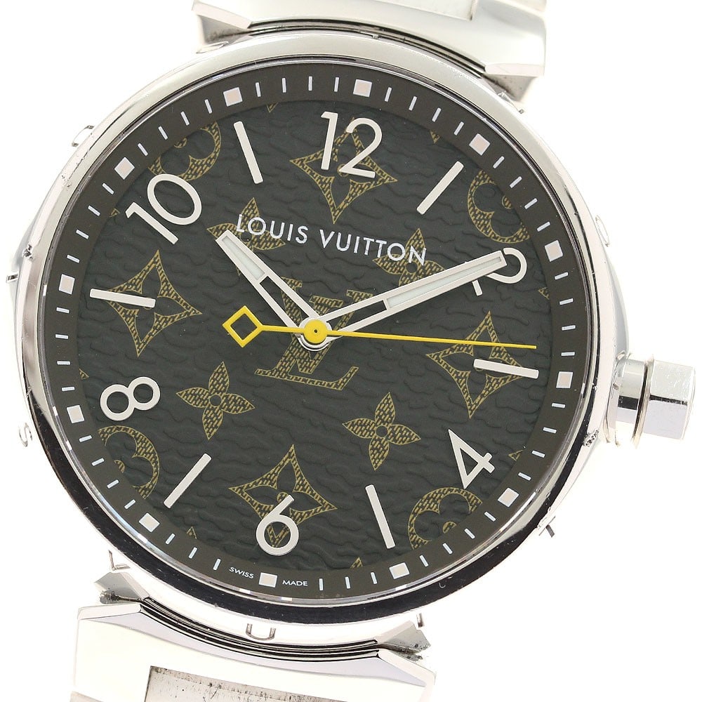 Louis Vuitton Tambour QA072 Monogram mens quartz wristwatch: Louis Vuitton Tambour QA072 Monogram mens quartz wristwatch Louis Vuitton Tambour Monogram men's wristwatch, reference QA072, with a quartz movement and Swiss origin. It features a stainless steel cas