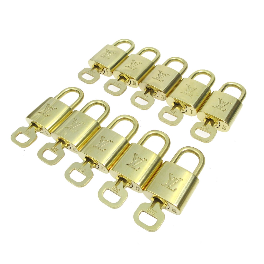 10 Piece Louis Vuitton Gold Tone Padlock and Key Charm Set: 10 Piece Louis Vuitton Gold Tone Padlock and Key Charm Set Set of 10 Louis Vuitton padlock and key bag accessories charms in a gold-tone finish. Made in France, this unisex accessory set shows overall