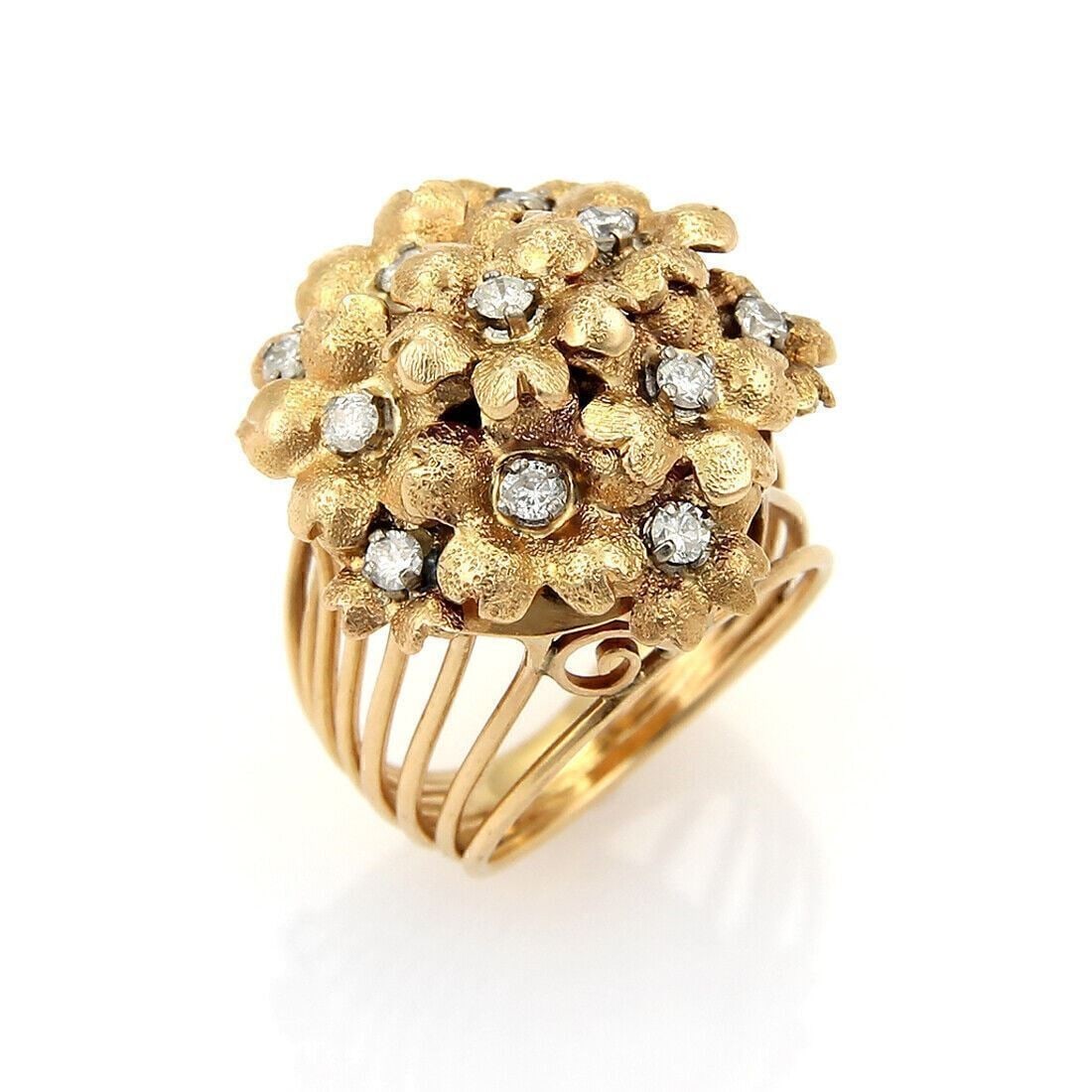 Vintage 18K Yellow Gold Tremblant Floral Diamond Ring Size 7: Vintage 18K Yellow Gold Tremblant Floral Diamond Ring Size 7 A vintage/estate Tremblant spring flowers ring crafted in 18k yellow gold with a floral cluster design accented by diamonds totaling approx