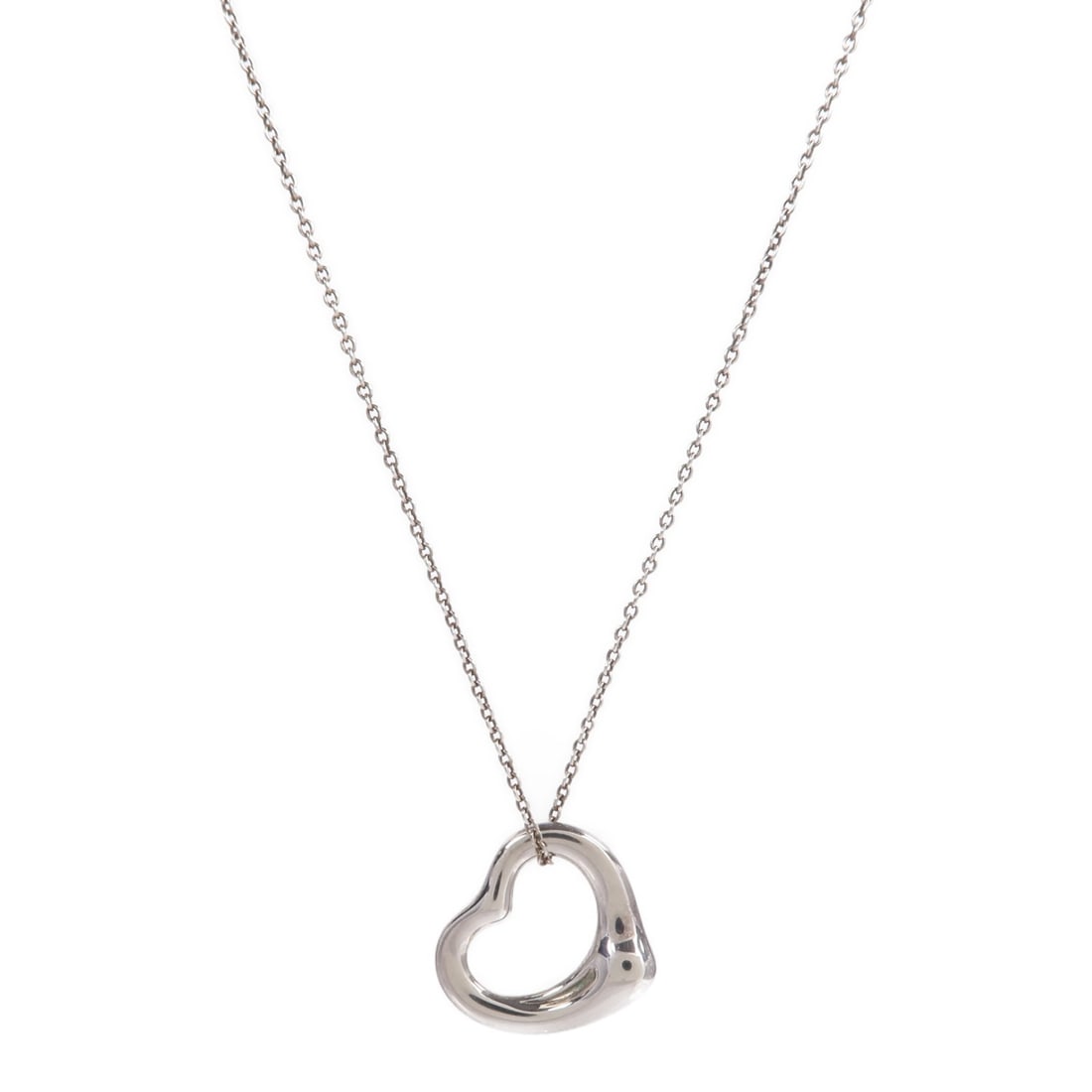 Tiffany Co Open Heart Sterling Silver 925 Necklace: Tiffany Co Open Heart Sterling Silver 925 Necklace Tiffany & Co. Open Heart Necklace in 925 sterling silver. The necklace features a silver Open Heart motif and comes with storage box and storage bags