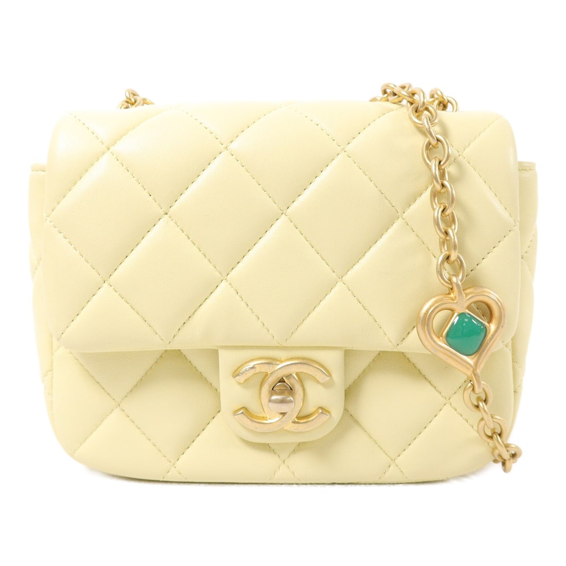 CHANEL AS3849 Mini Shoulder Bag Yellow Lambskin CC Heart Charm: CHANEL AS3849 Mini Shoulder Bag Yellow Lambskin CC Heart Charm A CHANEL mini chain shoulder bag in yellow and light yellow lambskin leather, featuring a CC heart charm and turn lock closure. The bag i