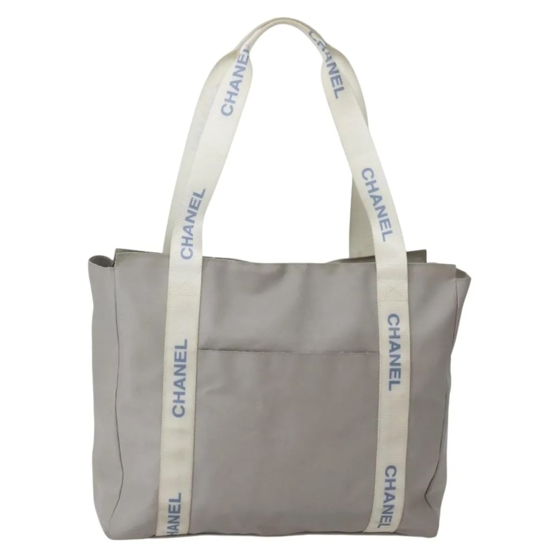 Chanel Sport Line Gray Nylon Tote Bag: Chanel Sport Line Gray Nylon Tote Bag This Chanel Sport Line Tote bag is crafted from gray nylon and designed for women. The bag features a spacious interior and a practical tote silhouette. Signs of 
