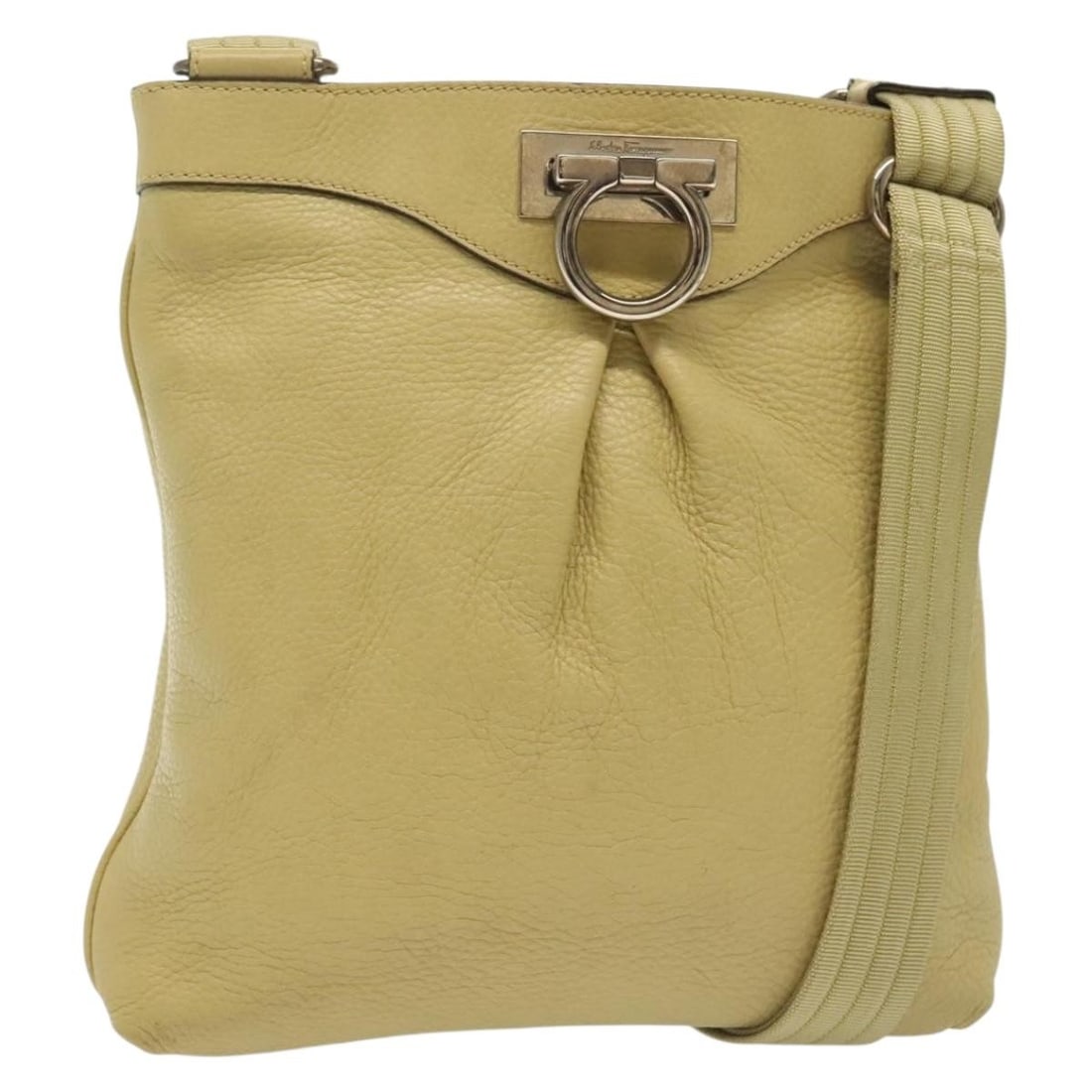 Salvatore Ferragamo Gancini Leather Shoulder Bag Yellow Silver Italy: Salvatore Ferragamo Gancini Leather Shoulder Bag Yellow Silver Italy This stylish Salvatore Ferragamo Gancini Shoulder Bag is crafted from high-quality leather and features a striking yellow and silve