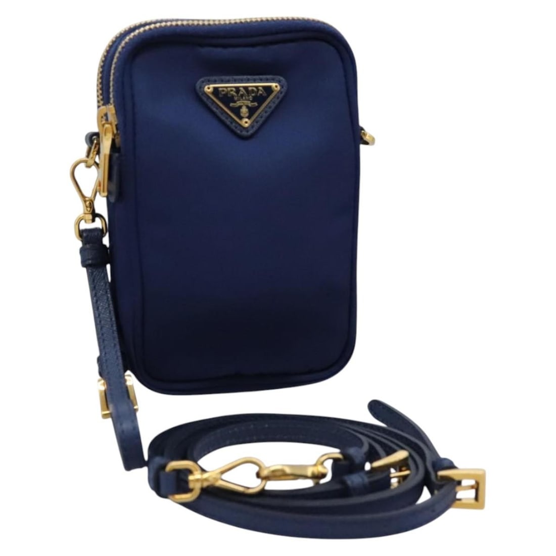 PRADA Nylon Mini Shoulder Bag Blue with Dust Bag: PRADA Nylon Mini Shoulder Bag Blue with Dust Bag Prada shoulder bag in blue nylon with gold-tone detailing. Made in Italy, this women's bag includes a dust bag. Condition is rated A: excellent, with s