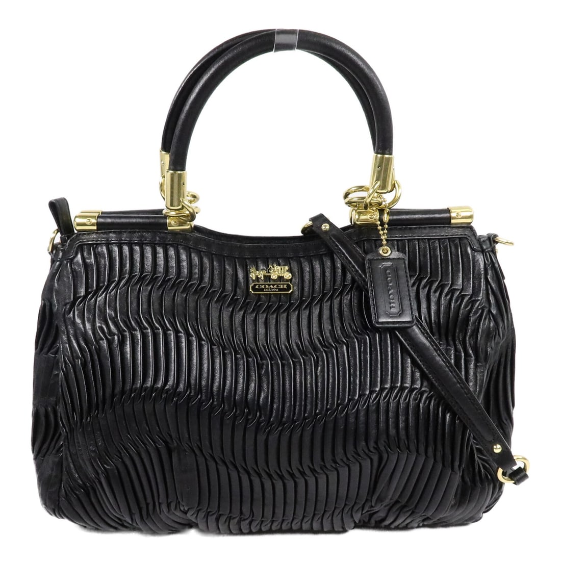 Coach Madison Carrie 21281 Calfskin Satchel Shoulder Bag Black: Coach Madison Carrie 21281 Calfskin Satchel Shoulder Bag Black This COACH Madison Carrie satchel bag is a 2-way shoulder bag in black calfskin (cowhide). It features a handle and shoulder strap, with 