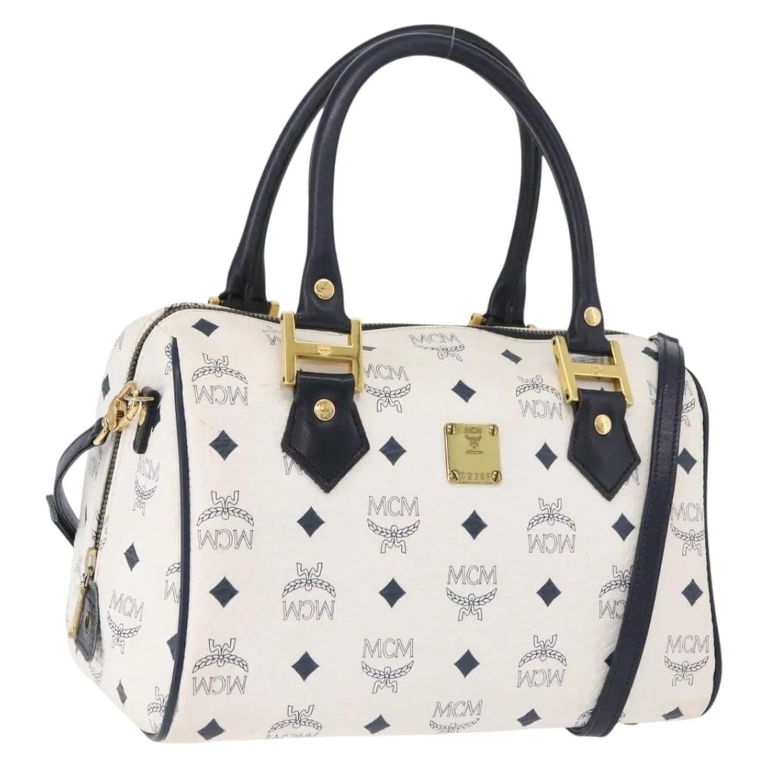 MCM Visetos logogramme white leather handbag 26cm x 17cm x 16cm: MCM Visetos logogramme white leather handbag 26cm x 17cm x 16cm MCM Visetos logogramme leather bag in white, designed for female use. It is made of leather and measures 26 cm x 17 cm x 16 cm. Country 